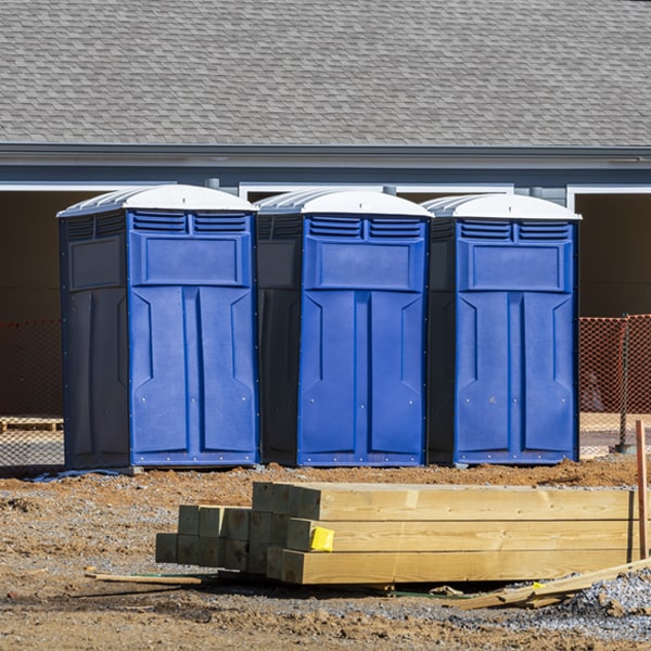 what is the cost difference between standard and deluxe porta potty rentals in Churdan